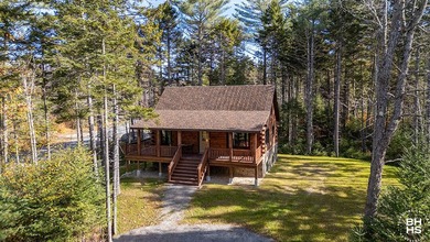 Lake Placid custom new completed log home is being offered for - photo 38