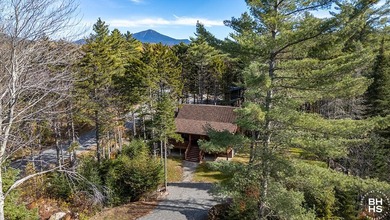 Lake Placid custom new completed log home is being offered for - photo 40