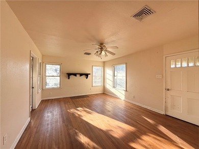 This spacious pier-and-beam home offers a flexible layout and