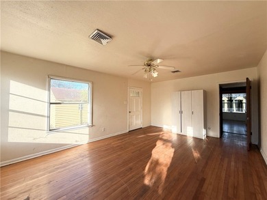 This spacious pier-and-beam home offers a flexible layout and