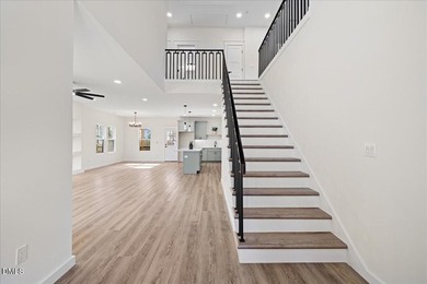 Stunning modern new construction in the gated lake community of - photo 11