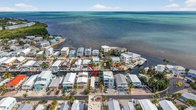 Canal front opportunity with direct ocean access! Located in a - photo 1