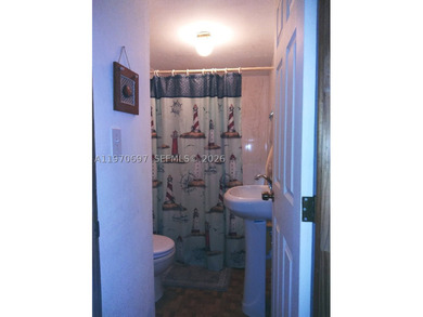Canal front opportunity with direct ocean access! Located in a - photo 10