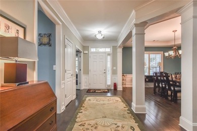 Welcome to this beautifully maintained four-bedroom, three-bath