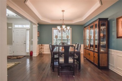 Welcome to this beautifully maintained four-bedroom, three-bath