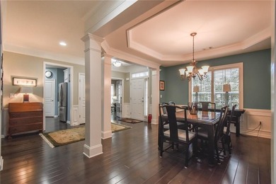 Welcome to this beautifully maintained four-bedroom, three-bath