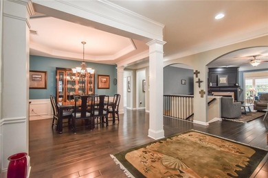 Welcome to this beautifully maintained four-bedroom, three-bath