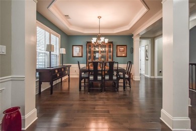 Welcome to this beautifully maintained four-bedroom, three-bath