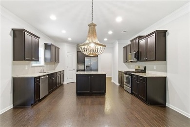 Welcome home to this beautifully designed executive residence in - photo 8
