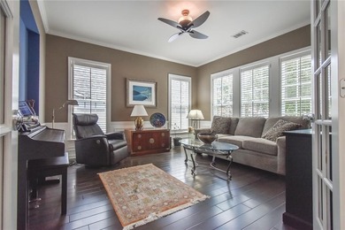 Welcome to this beautifully maintained four-bedroom, three-bath