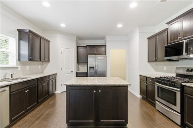 Welcome home to this beautifully designed executive residence in - photo 9