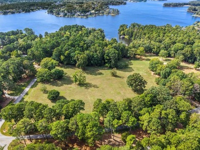 RARE CHANCE TO OWN OVER 10 ACRES OF LAKEFRONT PROPERTY ON THE - photo 1
