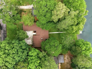So much to love!! Lakeside retreat located ON THE WATER in the - photo 4
