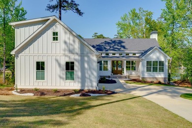 Lake living without compromise. This exceptional 2023-built home - photo 1