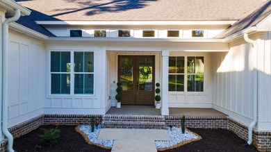 Lake living without compromise. This exceptional 2023-built home - photo 5