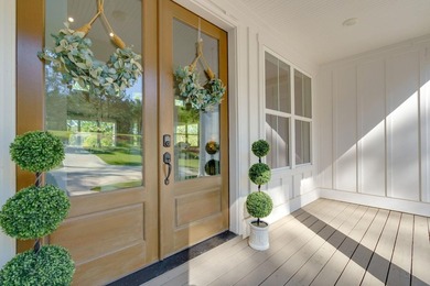 Lake living without compromise. This exceptional 2023-built home - photo 7