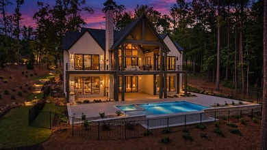 Welcome to your custom-crafted sanctuary on the serene shores of - photo 1