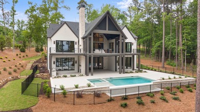 Welcome to your custom-crafted sanctuary on the serene shores of - photo 6