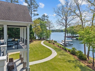 Experience luxury living in this stunning lakefront home nestled - photo 1