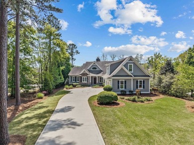 Experience luxury living in this stunning lakefront home nestled - photo 2