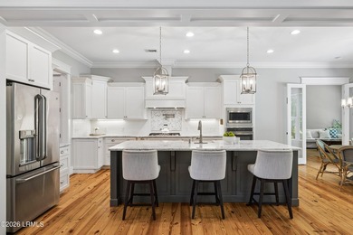 Nestled on a private wooded homesite in Hampton Hall, this - photo 21