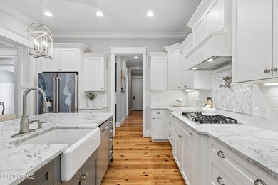 Nestled on a private wooded homesite in Hampton Hall, this - photo 28