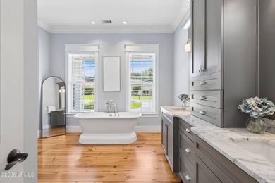 Nestled on a private wooded homesite in Hampton Hall, this - photo 37