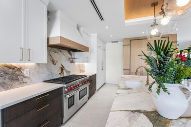 This Impeccably Renovated 5BDRM, 5.1BA Waterfront Residence - photo 11