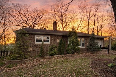 Nestled on a cul-de-sac, this inviting brick home sits on a - photo 17