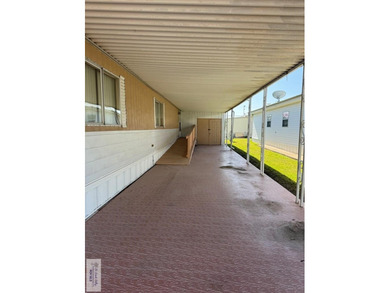 This well-kept 2-bedroom, 2-bathroom manufactured home is