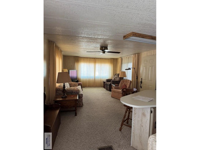 This well-kept 2-bedroom, 2-bathroom manufactured home is