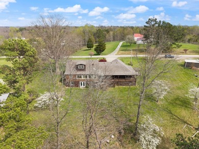 Tucked away in a private, peaceful setting, this one-of-a-kind - photo 12