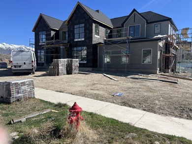 Discover elevated living in the heart of American Fork with this - photo 2