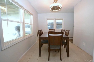 Welcome to 111 Fuller Ave in Islip! This charming, five-bedroom - photo 2