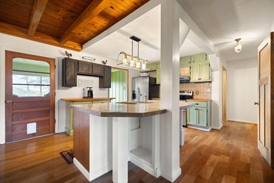Tucked away in a private, peaceful setting, this one-of-a-kind - photo 34