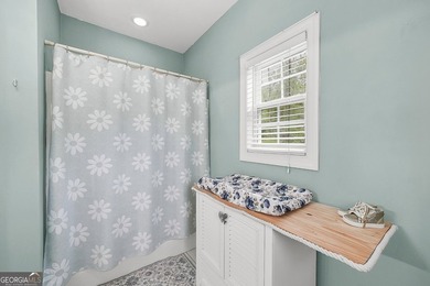 STUDIO APARTMENT ABOVE THE GARAGE. This is the kind of home that - photo 28