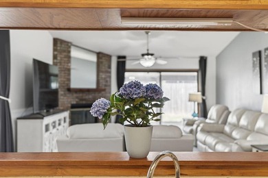 Discover this beautifully maintained garden home in the - photo 11
