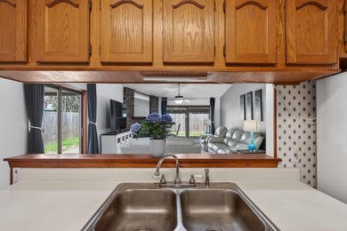 Discover this beautifully maintained garden home in the - photo 12