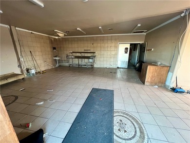 This B-4 zoned coastal commercial asset sits along one of Corpus