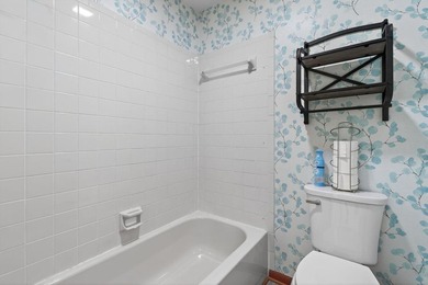 Discover this beautifully maintained garden home in the - photo 28