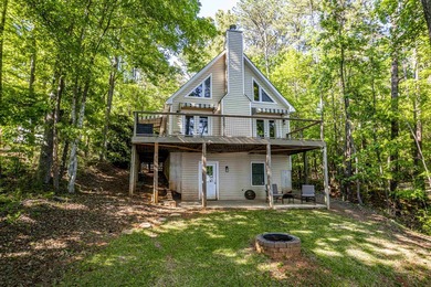 Welcome to 116 Sunfish Trail in Eatonton. This A-frame sits on - photo 1