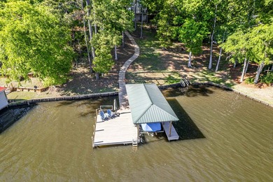 Welcome to 116 Sunfish Trail in Eatonton. This A-frame sits on - photo 2