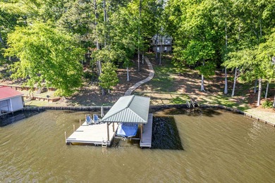 Welcome to 116 Sunfish Trail in Eatonton. This A-frame sits on - photo 3
