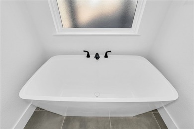 Welcome home to this stunning brand-new construction nestled in - photo 22