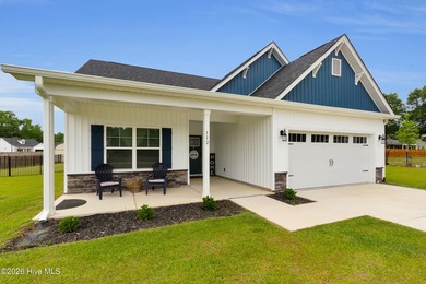 Nearly new 3BR/2BA coastal home blending modern comfort with - photo 2