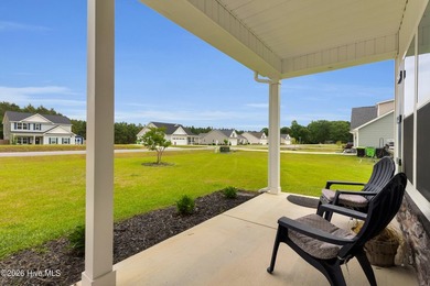 Nearly new 3BR/2BA coastal home blending modern comfort with - photo 3
