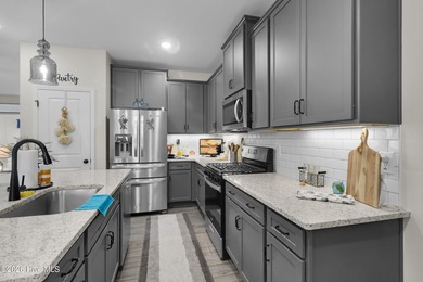Nearly new 3BR/2BA coastal home blending modern comfort with - photo 7