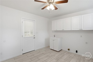 Located just minutes from Thunderbolt, this beautifully updated - photo 12