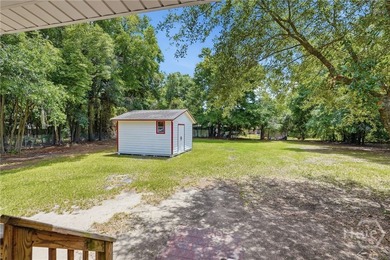 Located just minutes from Thunderbolt, this beautifully updated - photo 25