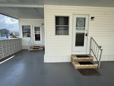 This 1971 home is offered turnkey and includes the golf cart! - photo 6